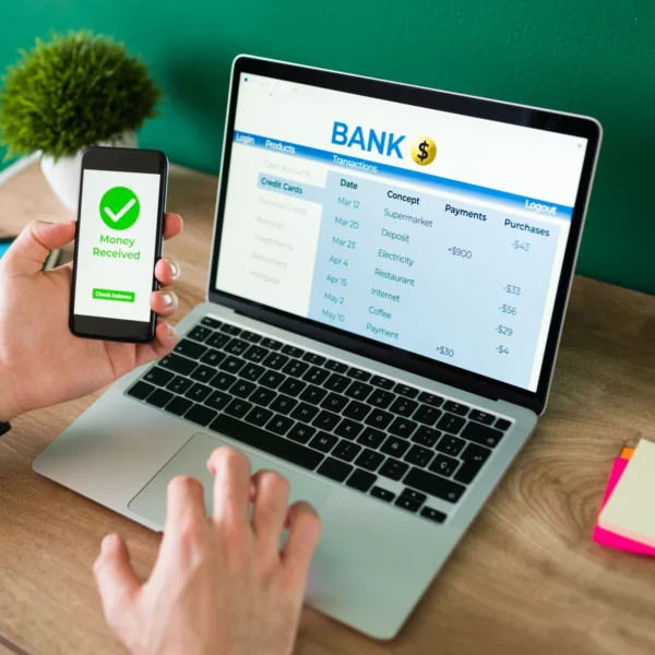 wire-transfer-young-man-using-his-smartphone-laptop-banking-transaction-some-payments